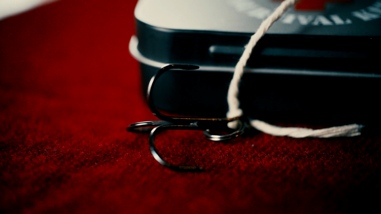 Hook by Eric Ross ~ This trick is so intense, some people can't watch. A roulette game with a fish hook... in your mouth. Screams are practically guaranteed.