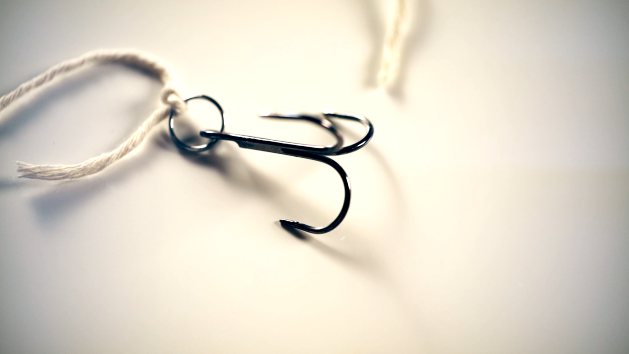 Hook by Eric Ross ~ This trick is so intense, some people can't watch. A roulette game with a fish hook... in your mouth. Screams are practically guaranteed.